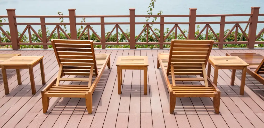 row of chaise lounges with handrail in park by the 2026 04 14 04 44 05